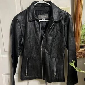 Vintage Wilson leather jacket for Harley girl , or any other girl.
is preowned